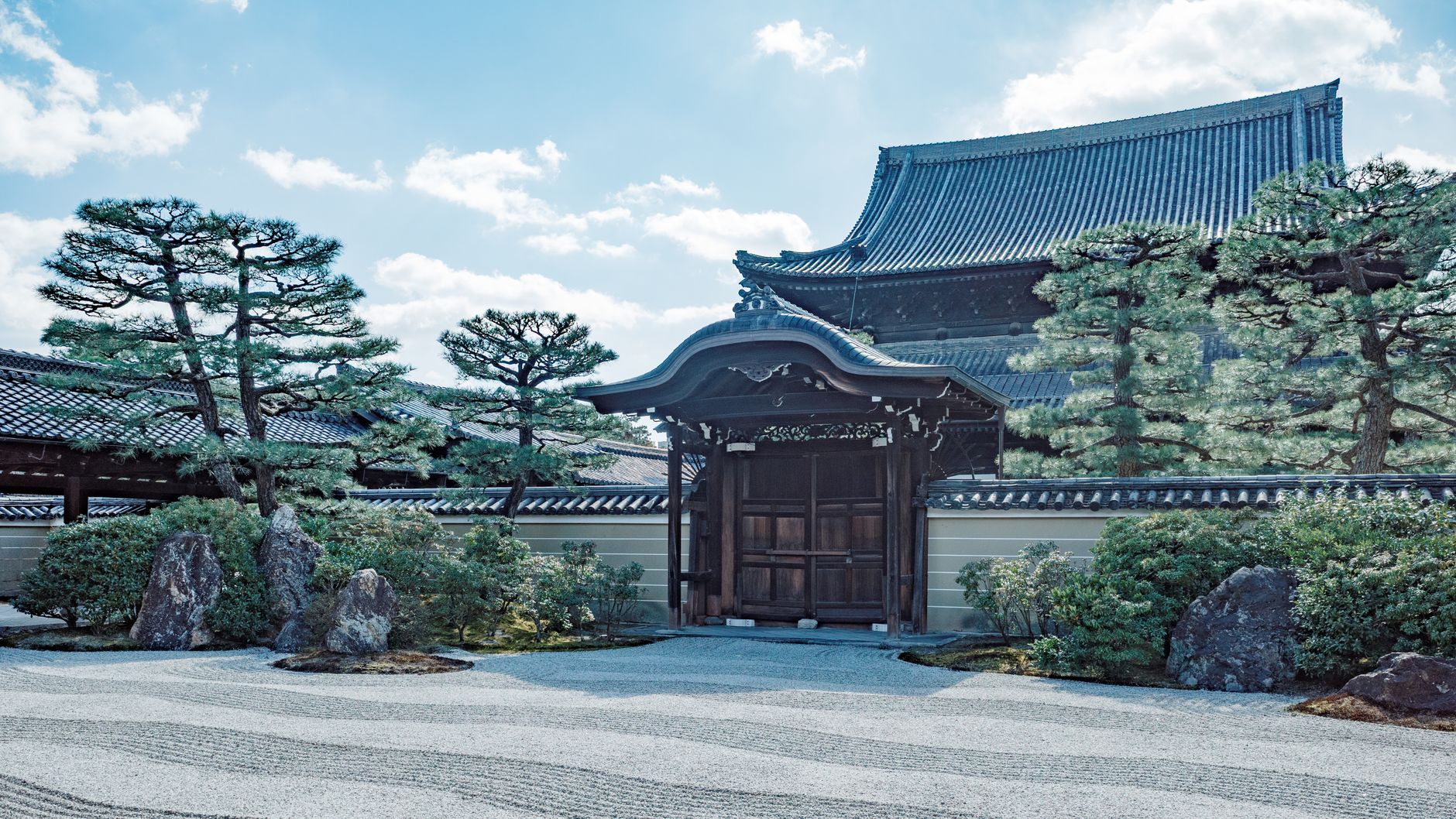 Traditional Japanese wooden temple and gravel garden